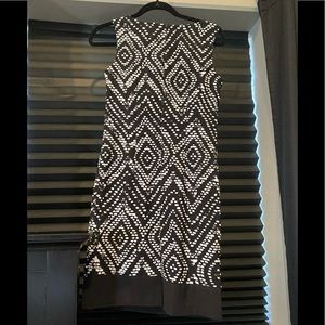 Like New! Black and White sheath dress. Perfect for any occasion!